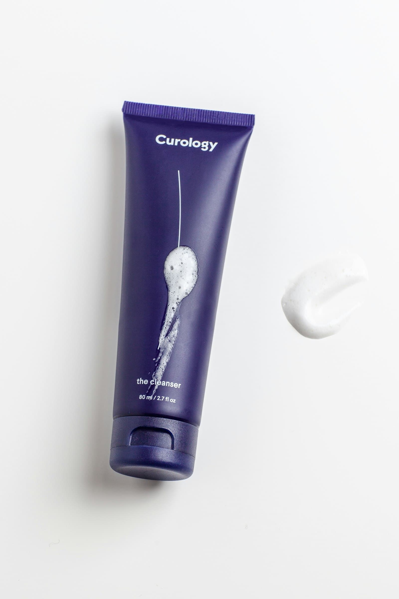 Skincare formulas arranged on a soft surface